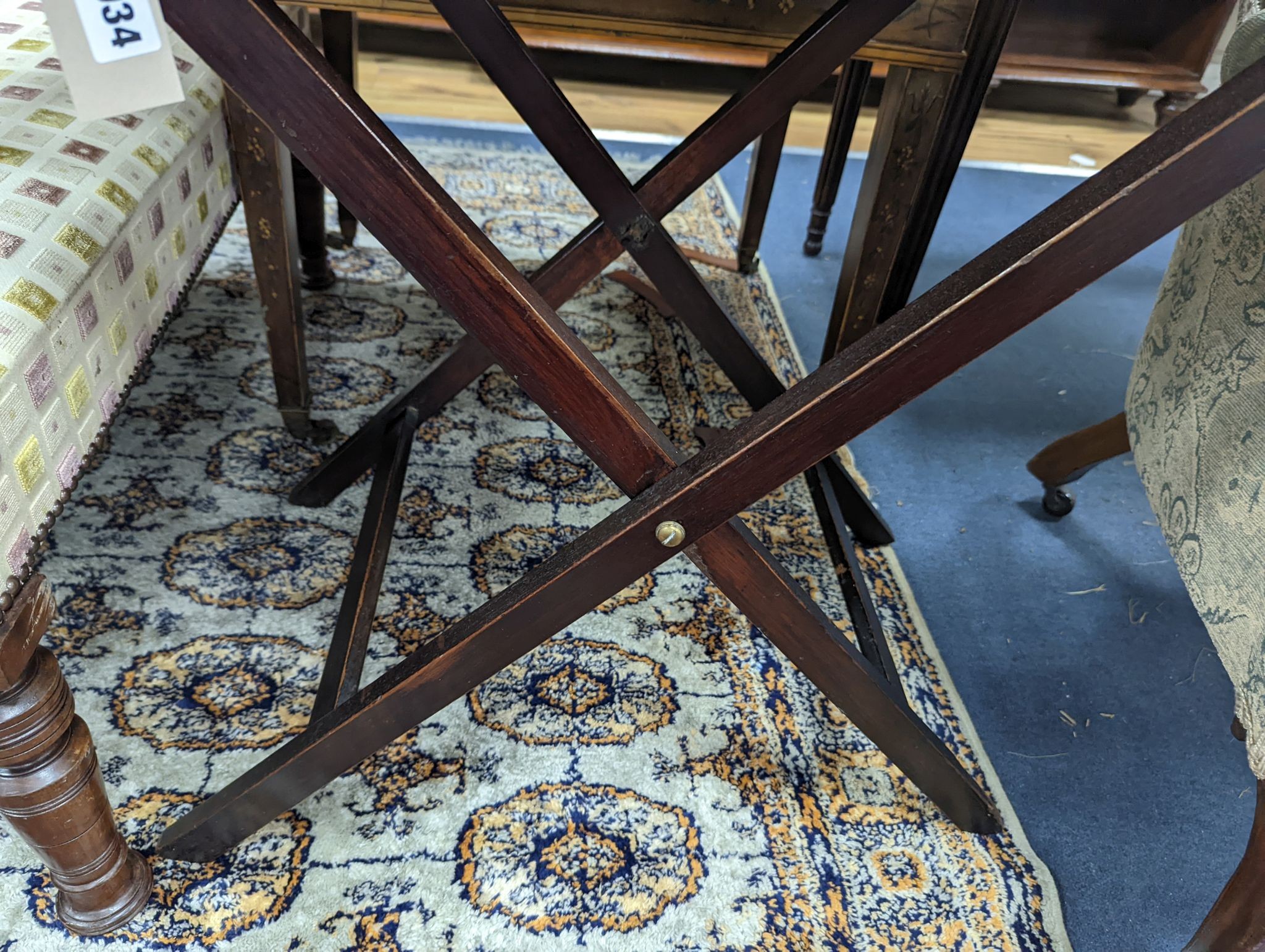 A Victorian rectangular mahogany butler's tray on folding stand, width 74cm, depth 50cm, height 78cm